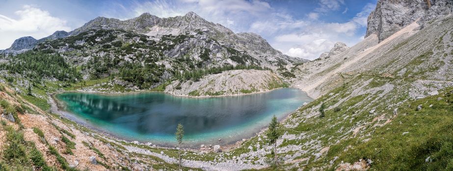 Scenic panoramic view of turquoise lake in Julian Alps, Slovenia