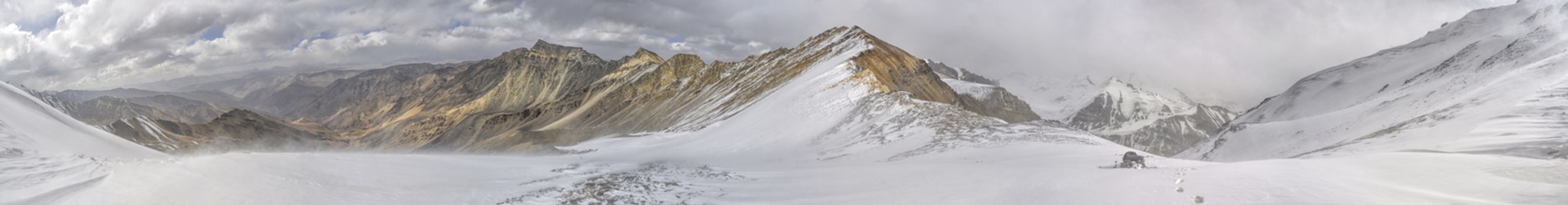 Scenic panorama of cold mountaineous landscape of Pamir mountain range  in Tajikistan