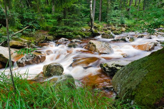 Wild creek Kamienna near the town Sklarska Poreba in Poland
