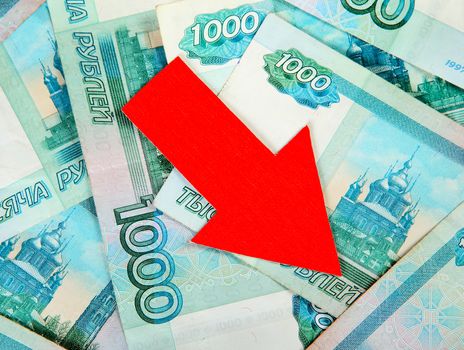 Russian Rubles and Red Arrow Down closeup