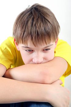 Sad and Tired Teenager on the White Background