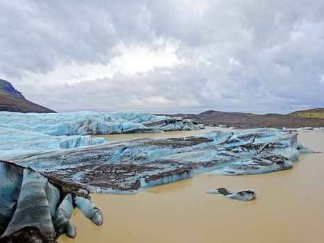 Ice rocks floating on Jokulsarlon lagoon in Iceland                                                         