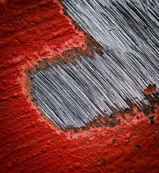 abstract background or texture red sanded paint on steel