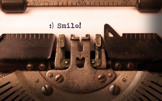 Vintage inscription made by old typewriter, smile