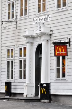 BERGEN, NORWAY - CIRCA JULY 2009: McDonald's restaurant set in an old Norwegian building.