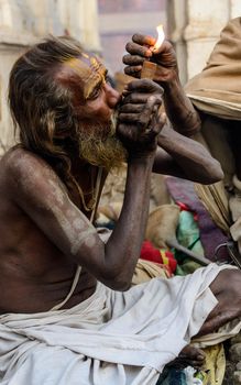 KATHMANDU, NEPAL - FEBRUARY 16, 2015: A sadhu in Pashupatinath for Maha Shivaratri which will be celebrated on February 17. Shivaratri is celebrated each year to honor Lord Shiva.