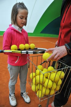 Children at school during a dribble of tennis