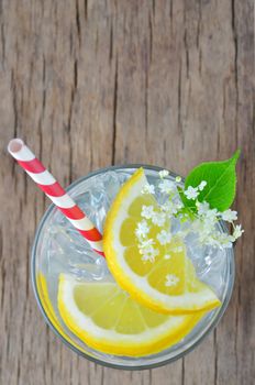 elderflower juice with lemon on old table