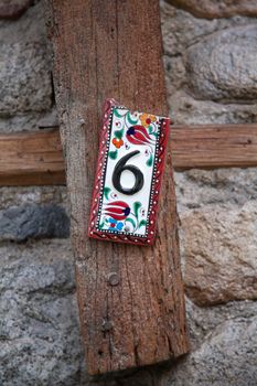 The number of old house on a ceramic in old village of Xanthi, Greece