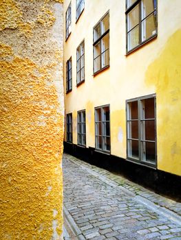 Bright yellow buildings in Gamla Stan, the old center of Stockholm.