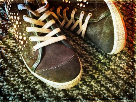 Fashionable shoes with metal rivets, teenager fashion.