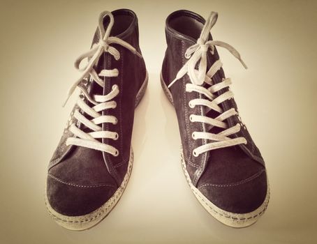 Fashionable sports shoes, teenager fashion, toned image.