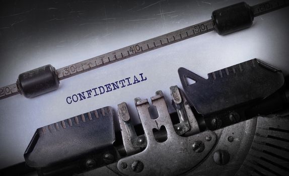 Vintage inscription made by old typewriter, Confidential