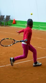 Children at school during a dribble of tennis