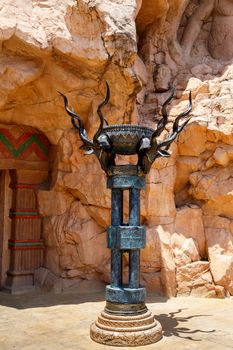 sculpture behind entry to fluttering Bridge of Time in Sun City, South Africa