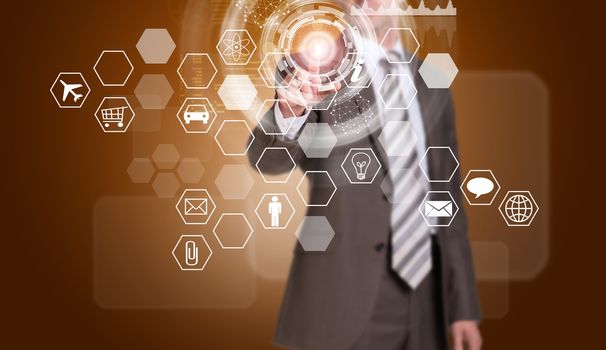 Businessman in suit finger presses virtual button. Hexagons with icons and glow circles