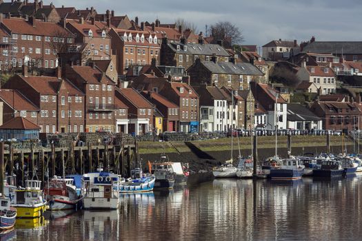 Part of the inner harbor at the port of Whitby on the North Yorkshire coast of England in the United Kingdom.