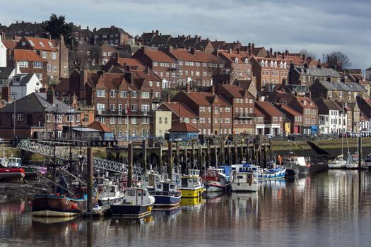 Part of the inner harbor at the port of Whitby on the North Yorkshire coast of England in the United Kingdom.