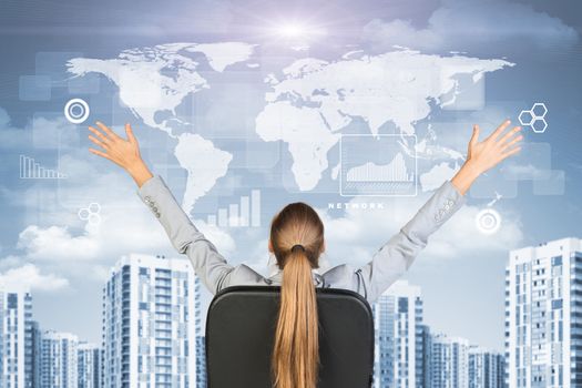 Businesswoman sitting with her hands outstretched against urban background with world map above and other virtual elements