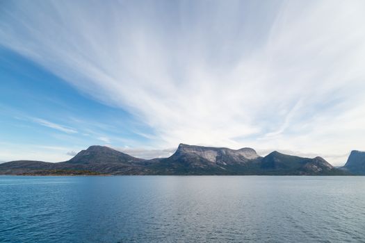 Picture of mountains with blue sea and sky