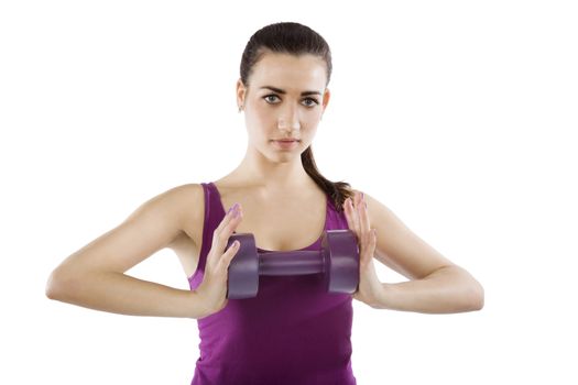 Beautiful girl holding dumbbell isolated on white background. Sport and fitness, healthy living.