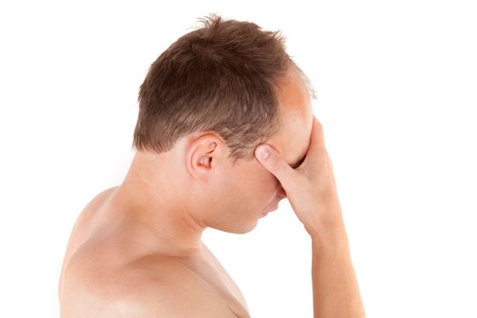 Headache. Young man touching his head isolated on white background. Headache and migraine concept. 