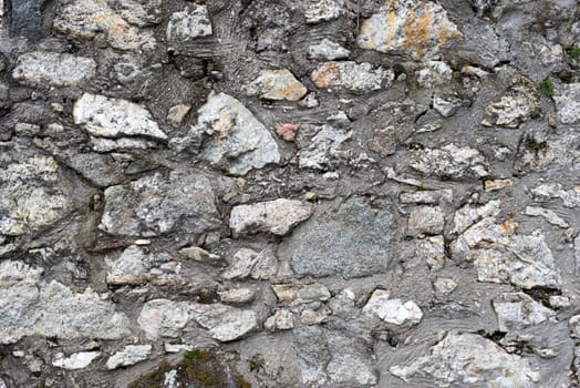 pattern gray color of modern style design decorative uneven cracked real stone wall surface with cement