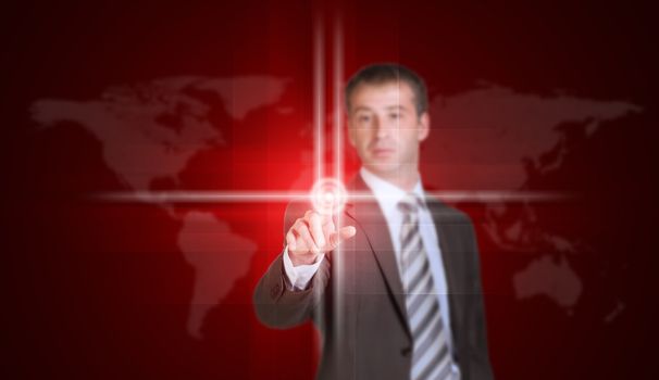 Businessman in suit finger presses virtual button. World map and glow circles