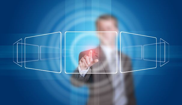 Businessman in suit finger presses virtual button. Glow circles and blue rectangles