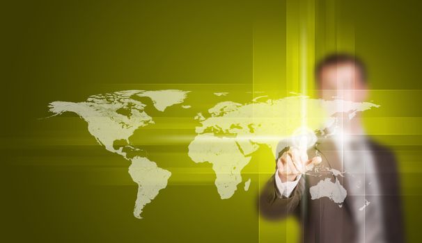 Businessman in suit finger presses virtual button. World map and glow circles