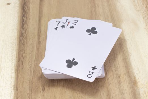 Playing Card on the wood