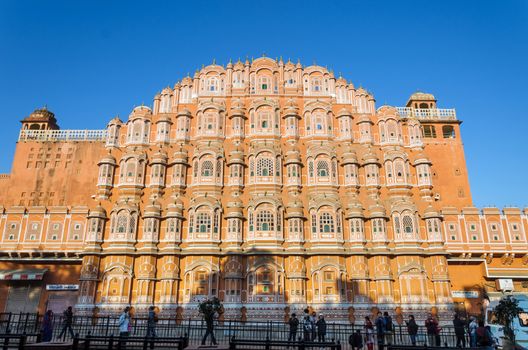 Jaipur, India - December 29, 2014: Unidentified tourists visit Hawa Mahal (Palace of winds), UNESCO World Heritage on December 29, 2014 in Jaipur, Rajasthan, India