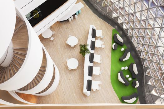 Lobby and winding staircase inside a modern building as view from the top