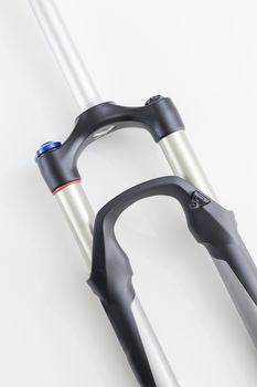 Generic mountain bike suspension fork on white background