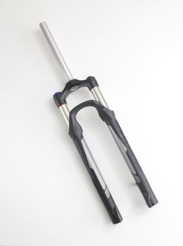 Generic mountain bike suspension fork on white background