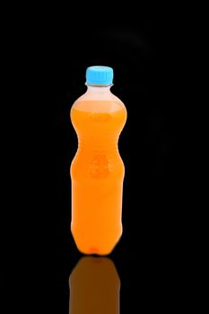 Orange sweet water in a plastic bottle