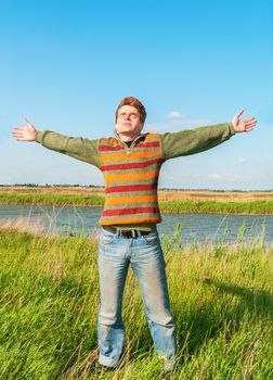 Young man having happy time in nature