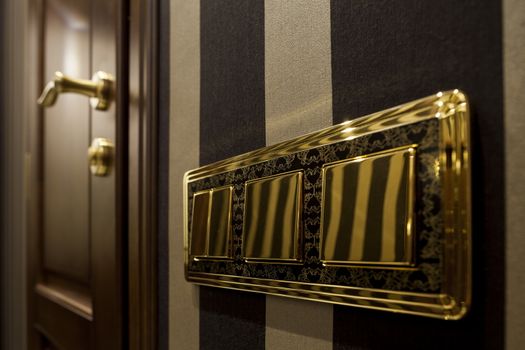golden home switch in the interior soft focus
