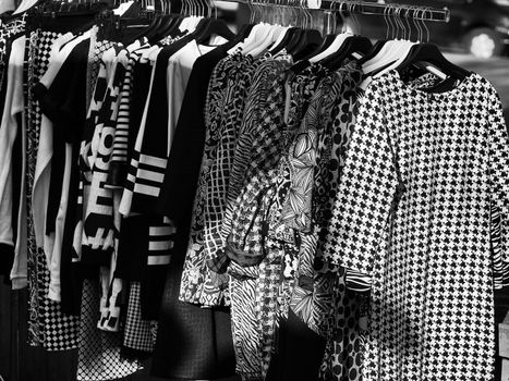 Black and White image of clothes at street market