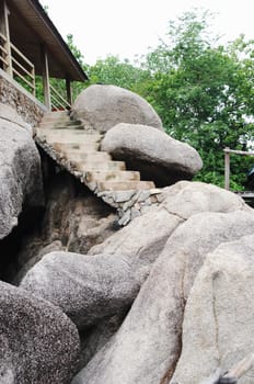 House and stairs on huge stones.Koh Nanguan, Thailand
