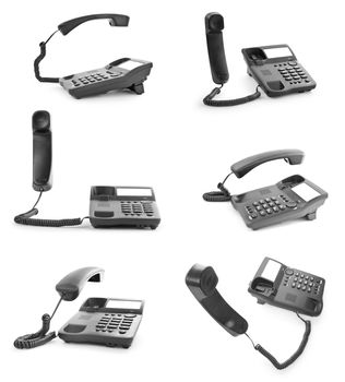 Collection of office phones with the handset lifted upwards