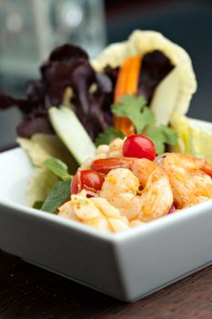 Thailand style shrimp and squid salad with veggies.