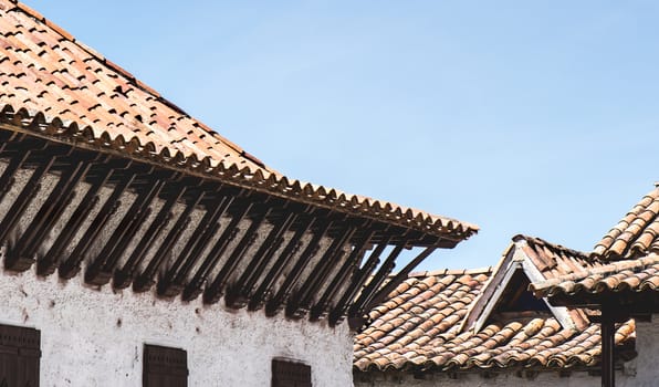 Traditional colonial roof of Colombia formed by clay tiles