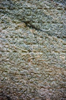 Granite surface of the Jewish gravestone with the inscription.