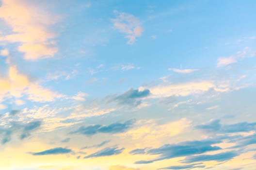 Clouds illuminated by sunlight on the sky. Sunset.