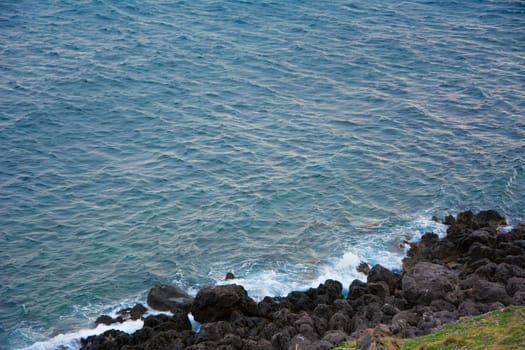 Rocky coastline hit by waves.