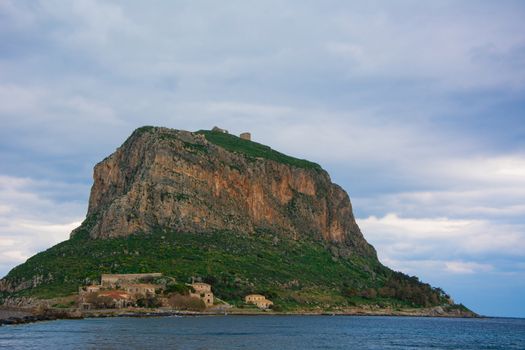 Distant view of the Monemvasia hill, with the castle remnants.