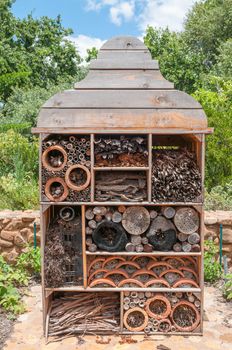 CAPE TOWN, SOUTH AFRICA - DECEMBER 21, 2014: Insect hotel on a farm near Paarl in the Western Cape Province of South Africa. It is used as nest for useful insects to control pests and pollinate plants
