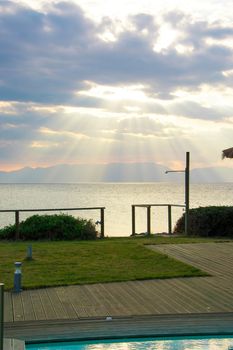 Looking the nice sunset by the pool. Picture taken in Peloponnese, Greece.