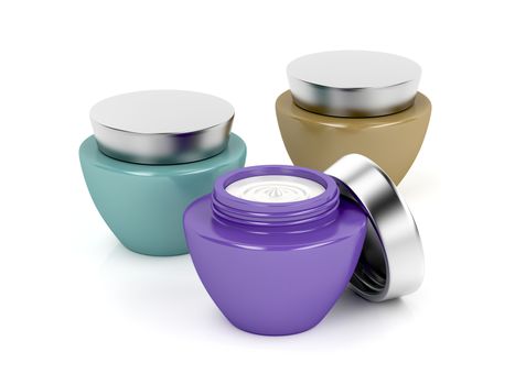Three different cosmetic creams on white background